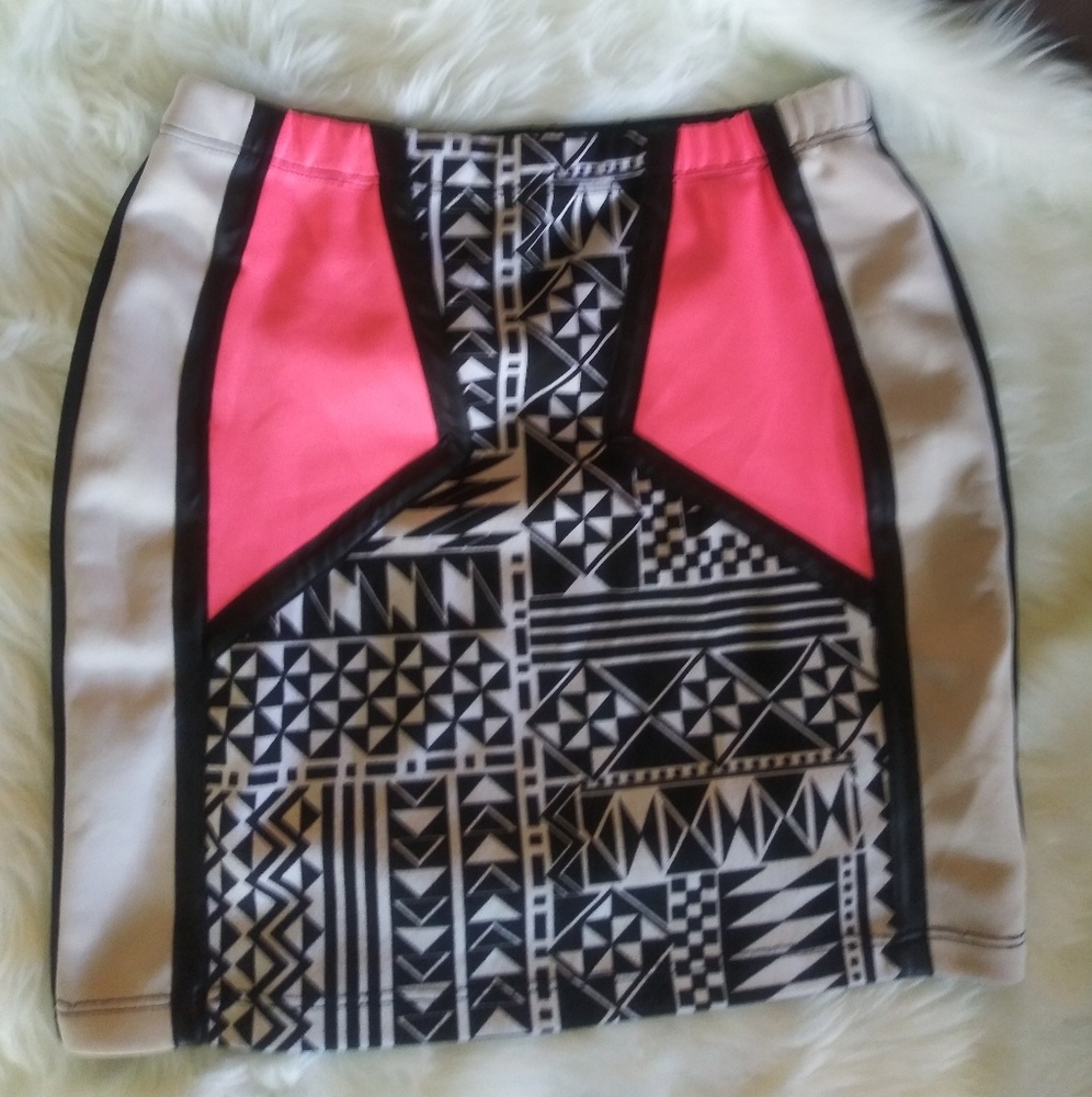 Tribal print nude and neon pink skirt.